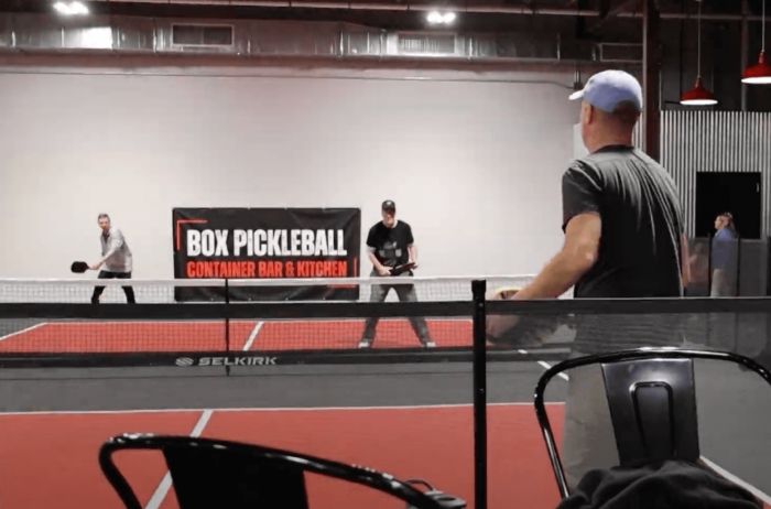 Competitors on the court at Box Pickleball.